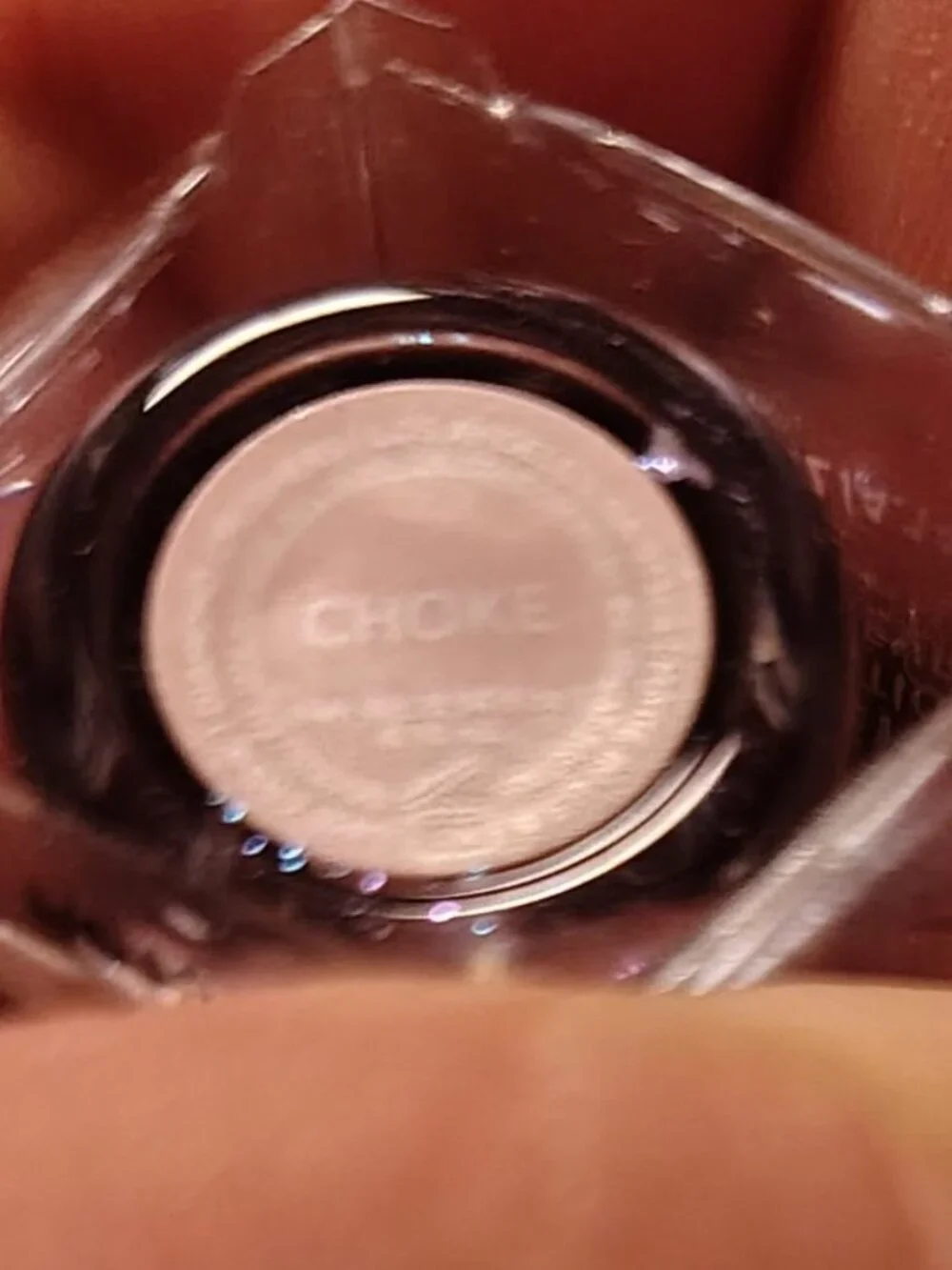 The Lime Crime Diamond Crushers Iridescent Lip Topper in the shade Choke